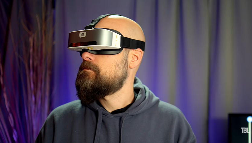 Sam from The Blind Life wearing the Vision Buddy Mini headset